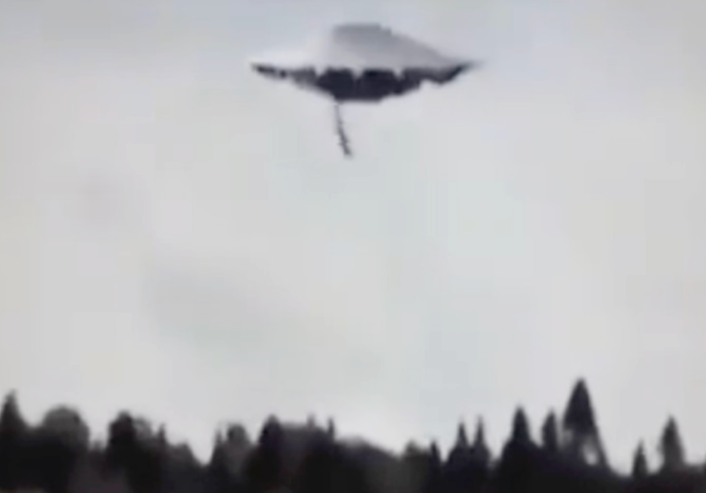 Caught on Camera: UFO Spotted Dropping Object Into Forest &ndash; Astonishing